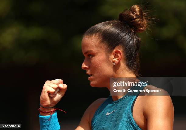Maria Sakkari of Greece celebrates during the ladies singles first round match against Mandy Minnela of Luxembourg during day two of the 2018 French...
