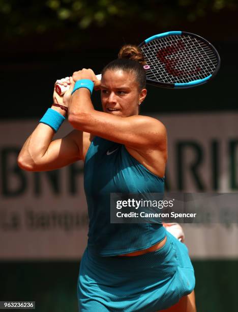 Maria Sakkari of Greece plays a backhand during the ladies singles first round match against Mandy Minnela of Luxembourg during day two of the 2018...