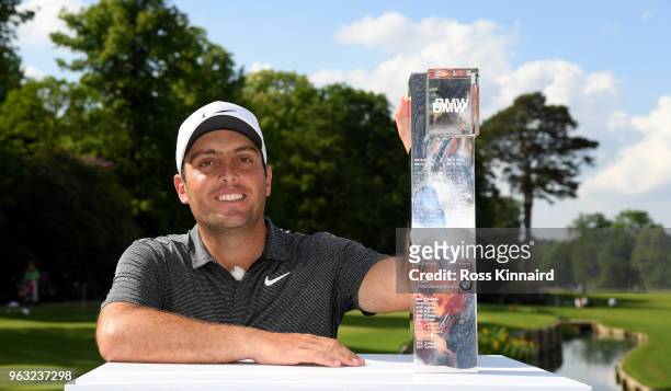Francesco Molinari of Italy with the winners trophy on the 18th green after the final round of the BMW PGA Championship at Wentworth on May 27, 2018...