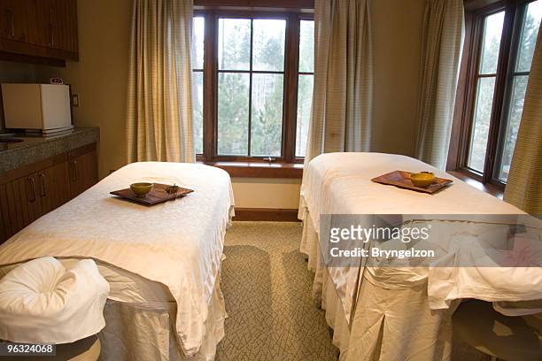 massage tables for two - massage table no people stock pictures, royalty-free photos & images