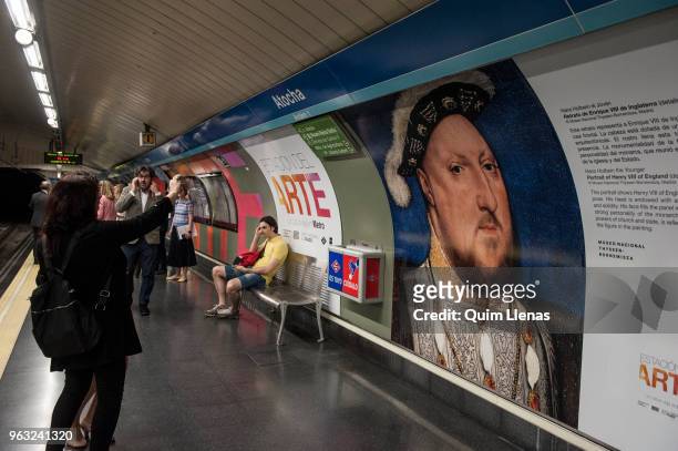 The painting 'Retrato de Enrique VIII de Inglaterra' by Hans Holbein the Younger is displayed on the walls of the Atocha metro station, named since...