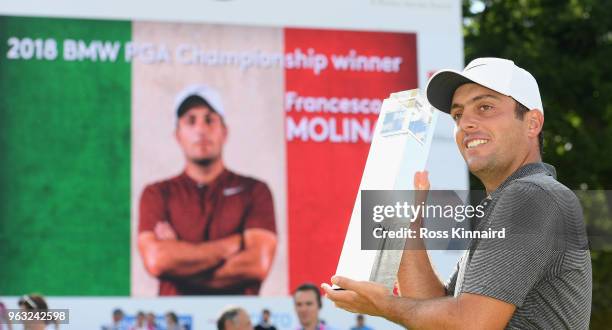 Francesco Molinari of Italy pictured with the winners trophy on the 18th green after the final round of the BMW PGA Championship at Wentworth on May...