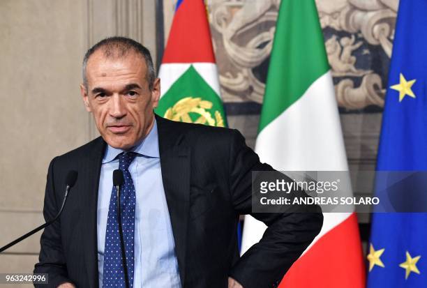 Carlo Cottarelli addresses a press conference at the Qurinale presidential palace on May 28, 2018 in Rome after Italian President gave him mandate to...