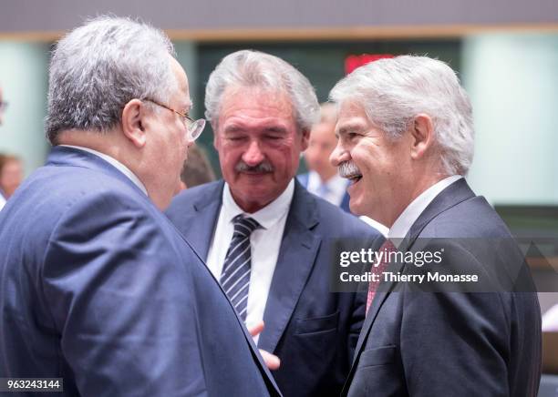 Greek Minister of Foreign Affairs Nikos Kotzias talks with the Luxembourg Minister of Foreign Affairs & Immigration Jean Asselborn and the Spanish...