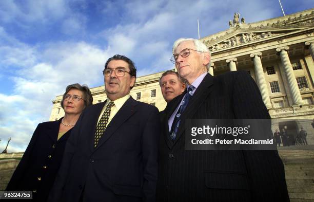 The first day of the Stormont Assembly, 29th November 1999. SDLP representatives pose outside the parliament building. From left to right, they are...