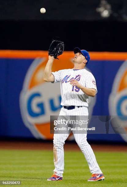 Jay Bruce of the New York Mets catches an outfield fly ball in an MLB baseball game against the Miami Marlins on May 23, 2018 at Citi Field in the...