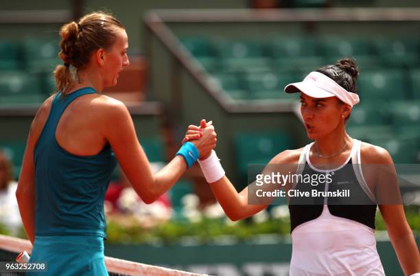 Petra Kvitova of Czech Republic is congratulated by Veronica Cepede Royg of Paraguay following their ladies singles first round match during day two...