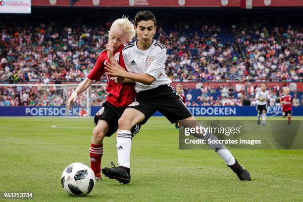 Jorden Kuyt, Shaqueel van Persie during the Dirk Kuyt Testimonial at the Feyenoord Stadium on May 27, 2018 in Rotterdam Netherlands