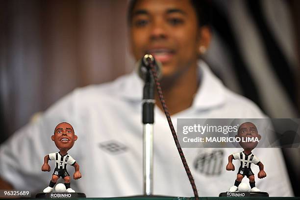 Brazilian football player Robinho answers questions at Vila Belmiro stadium during a press conference at his official presentation to the club, in...