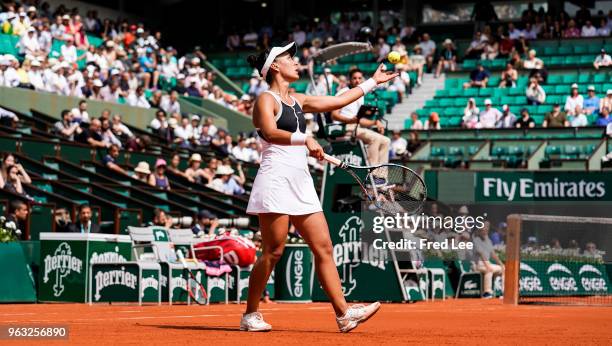 Veronica Cepede Royg of Paraguay serves during the ladies singles first round match aganist Petra Kvitova of Czech Republic during day two of the...