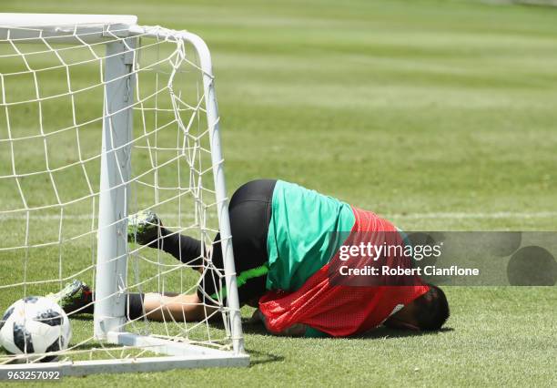 Jamie McLaren of Australia collides with the goal during the Australian Socceroos Training Session at the Gloria Football Club on May 28, 2018 in...