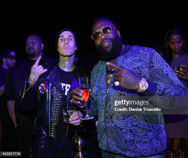 Travis Barker and Rick Ross attend day 3 of the grand opening weekend of APEX Social Club at Palms Casino Resort on May 27, 2018 in Las Vegas, Nevada.