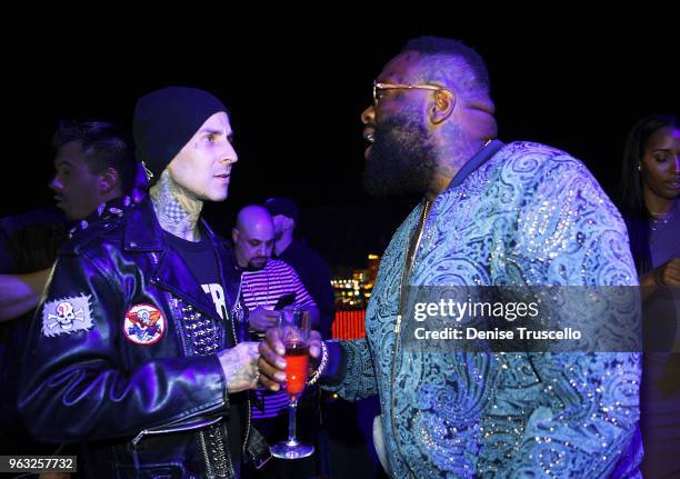 Travis Barker and Rick Ross attend day 3 of the grand opening weekend of APEX Social Club at Palms Casino Resort on May 27, 2018 in Las Vegas, Nevada.