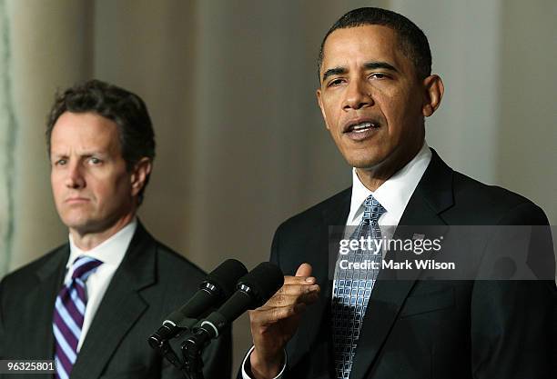 President Barack Obama speaks about his budget for fiscal year 2011, while flanked by Treasury Secretary Timothy Geithner at the White House on...