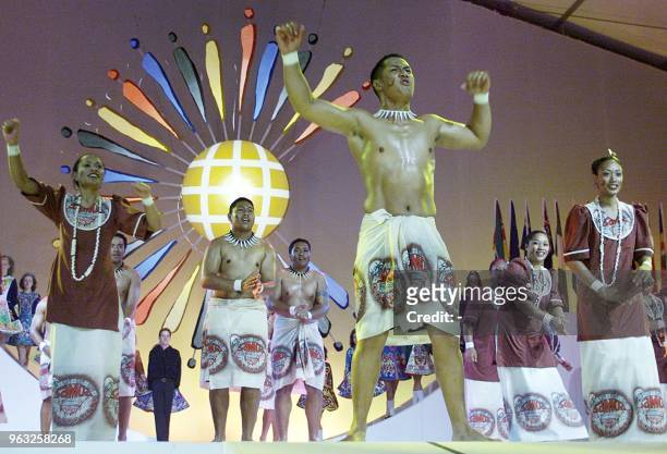 Samoan dancers perform during the opening ceremony for the Commonwealth Heads of Government Meeting in Coolum, 02 March 2002. Representatives from 51...