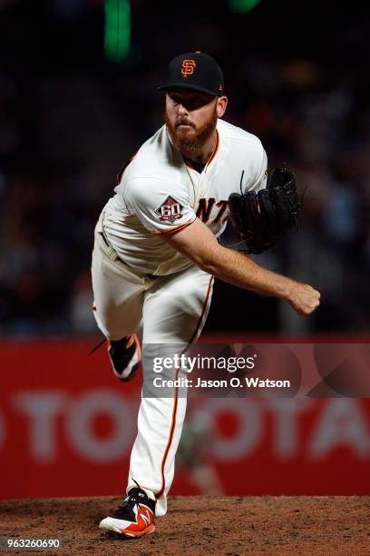 Sam Dyson of the San Francisco Giants pitches against the Colorado Rockies during the eighth inning at AT&T Park on May 17, 2018 in San Francisco,...