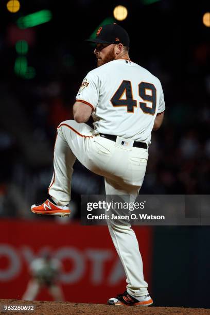 Sam Dyson of the San Francisco Giants pitches against the Colorado Rockies during the eighth inning at AT&T Park on May 17, 2018 in San Francisco,...