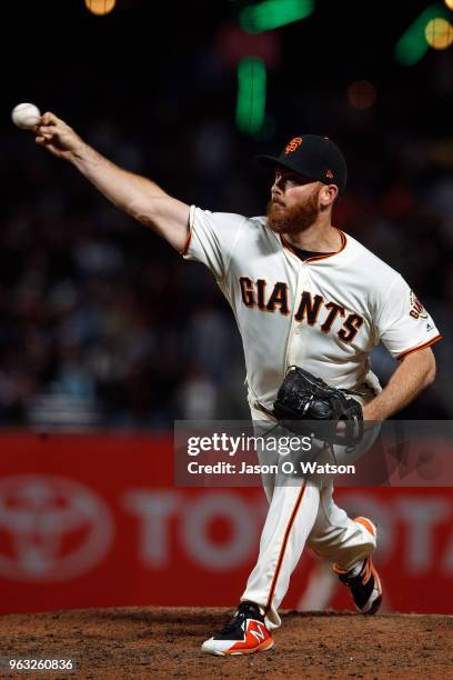 Sam Dyson of the San Francisco Giants pitches against the Colorado Rockies during the eighth inning at AT&T Park on May 17, 2018 in San Francisco,...