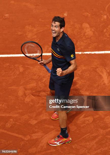 Guillermo Garcia-Lopez of Spain celebrates victory duirng the mens singles first round match against Stan Wawrinka of Switzerland during day two of...