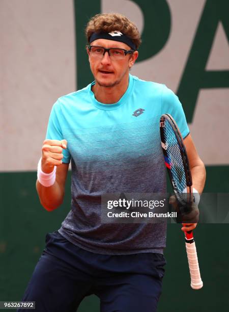 Denis Istomin of Uzbekistan celebrates during the mens singles first round match against Roberto Bautista Agut of Spain during day two of the 2018...