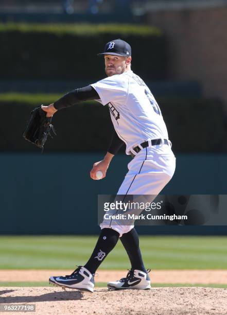 Shane Greene of the Detroit Tigers throws a warm-up pitch during game one of a doubleheader against the Kansas City Royals at Comerica Park on April...