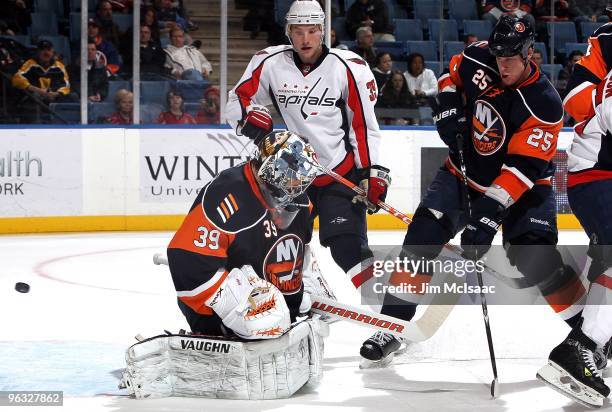 Rick DiPietro of the New York Islanders skates against the Washington Capitals on January 26, 2010 at Nassau Coliseum in Uniondale, New York.