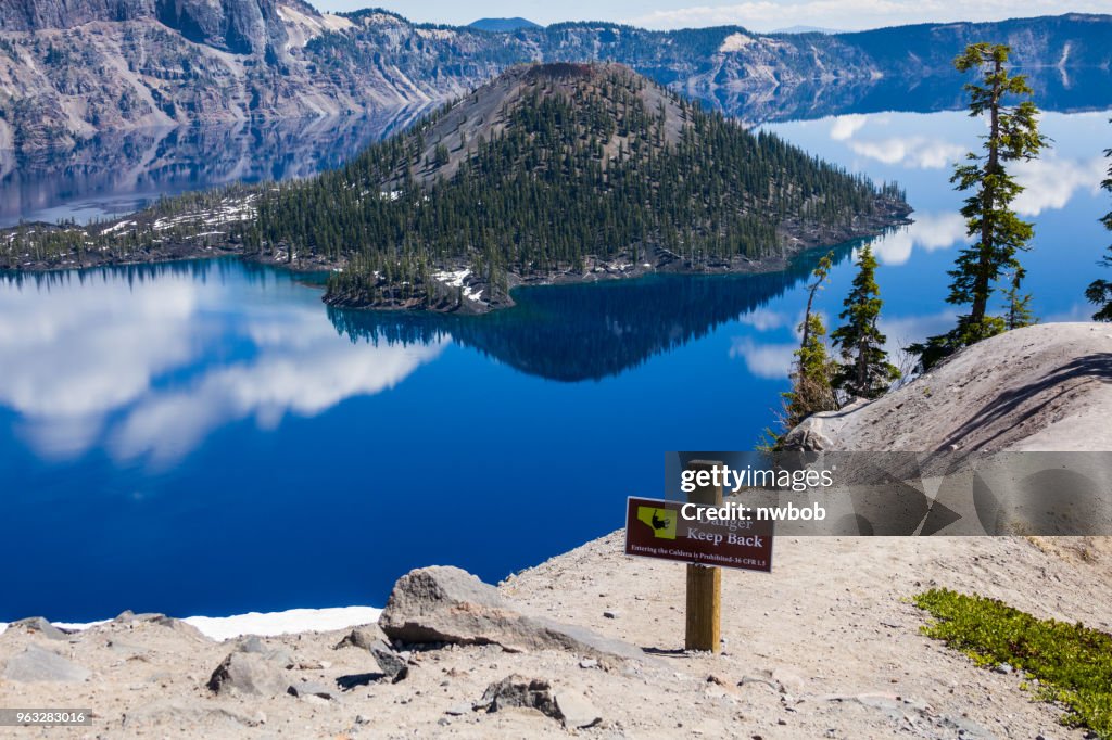 Crater lake sign to protect tourists from falls