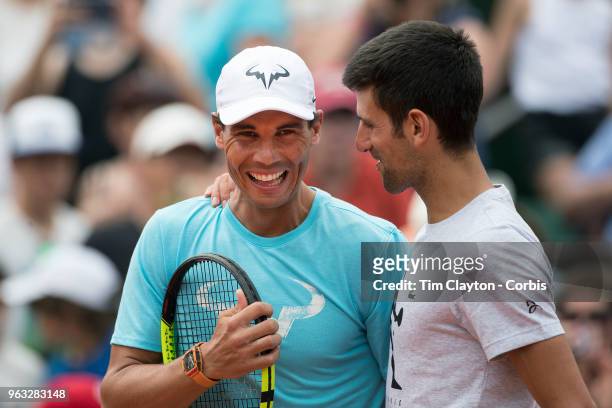 French Open Tennis Tournament - Rafael Nadal of Spain and Novak Djokovic of Serbia while playing a tie break doubles exhibition match against Simone...