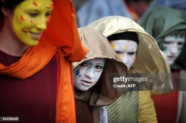 Dancers from France prepare to show their dance during the International Festival of the Masquerade Games in Pernik near Sofia, on January 30, 2010....