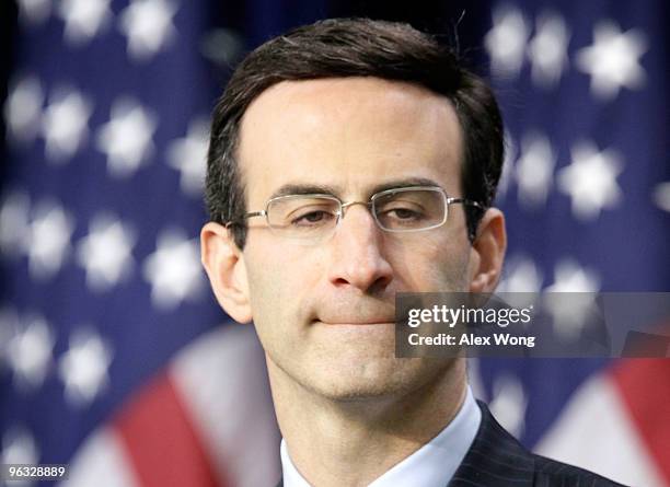 Director of the White House Office of Management and Budget Peter Orszag listens during a news conference at the Eisenhower Executive Office Building...