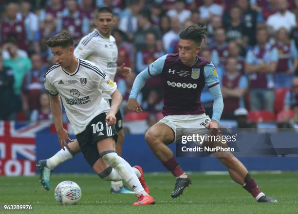 Fulham's Tom Cairney and Jack Grealish of Aston Villa during the Championship Play-Off Final match between Fulham and Aston Villa at Wembley, London,...