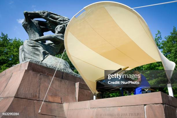 Joanna awrynowicz-Just is seen playing at one of the regular, free Chopin open air concerts in the Royal Baths park in Warsaw, Poland on May 27,...