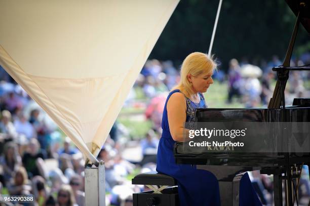 Joanna awrynowicz-Just is seen playing at one of the regular, free Chopin open air concerts in the Royal Baths park in Warsaw, Poland on May 27,...