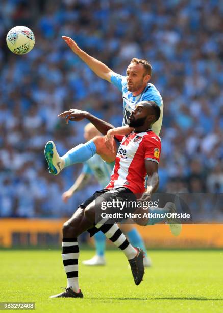 Liam Kelly of Coventry City in action with Hiram Boateng of Exeter City during the Sky Bet League Two Play Off Final between Coventry City and Exeter...