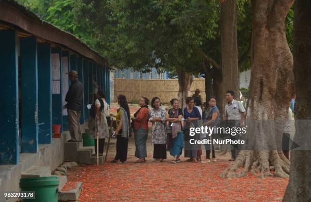 Voters stand in queue to cast their vote during the Lok Shabha bye-election in Dimapur, India north eastern state of Nagaland on Monday 28, 2018. The...