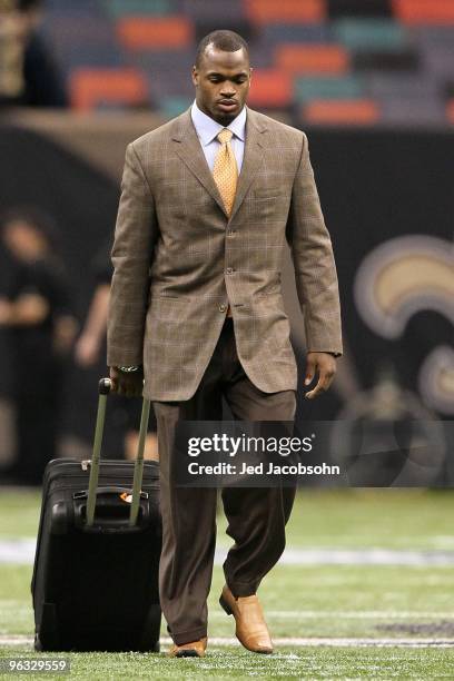 Adrian Peterson of the Minnesota Vikings arrives at the dome to play against the New Orleans Saints during the NFC Championship Game at the Louisiana...