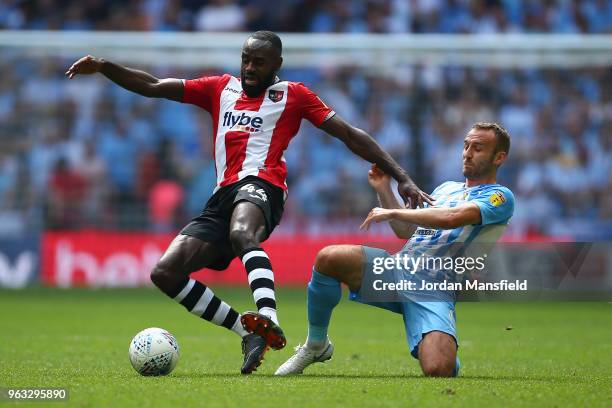 Hiram Boateng of Exeter City and Liam Kelly of Coventry battles for possession during the Sky Bet League Two Play Off Final between Coventry City and...