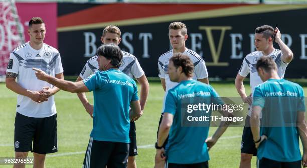 Head coach Jochaim Loew of Germany gives instructions and Niklas Suele of Germany, Nils Petersen of Germany, Matthias Ginter of Germany and Julian...