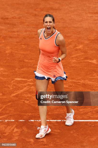 Andrea Petkovic of Germany celebrates during the ladies singles first round match against Kristina Mladenovic of France during day two of the 2018...