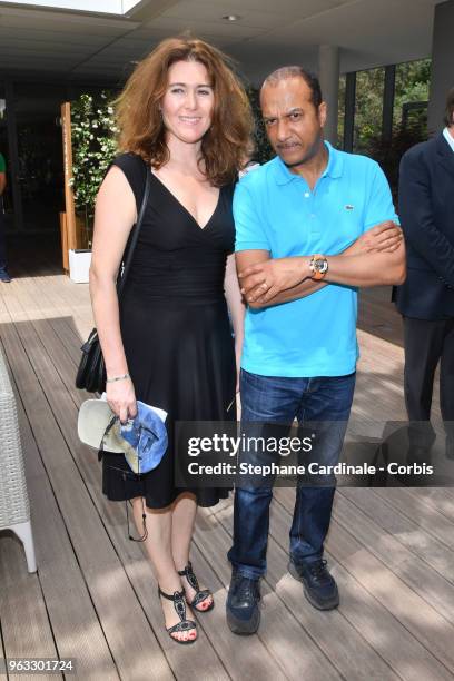 Pascal Legitimus and and his wife Adriana Santini attend the 2018 French Open - Day Two at Roland Garros on May 28, 2018 in Paris, France.