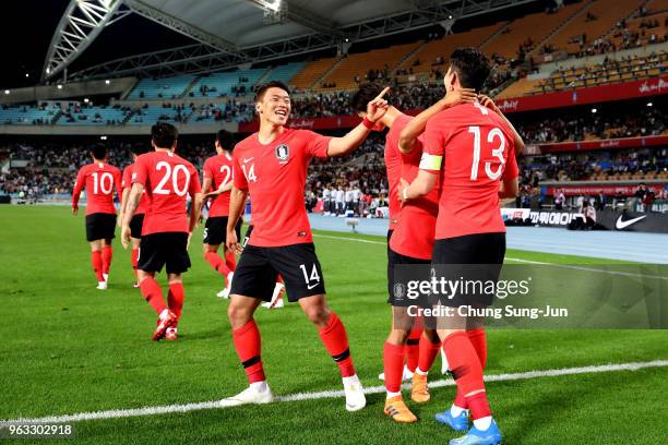 South Korea Son Heung-Min of South celebrates with his team mates after scoring a goal during the international friendly match between South Korea...