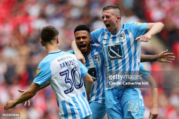 Jordan Willis of Coventry City celebrates with team mates after scoring their sides first goal during the Sky Bet League Two Play Off Final between...