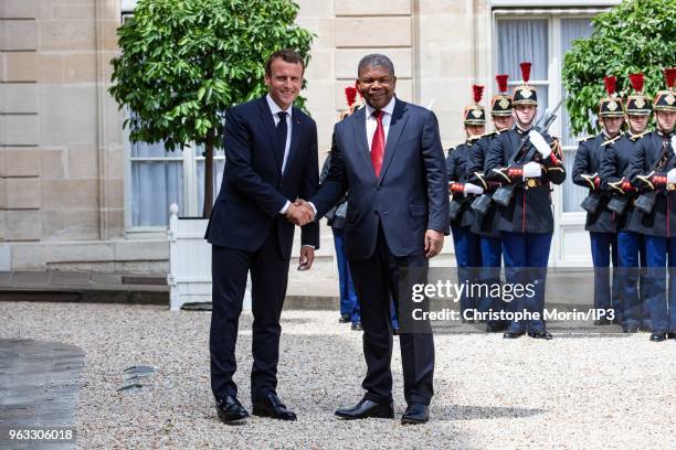 French President Emmanuel Macron welcomes the President of Angola Joao Lourenco for a meeting at Elysee Palace on May 28, 2018 in Paris, France. The...