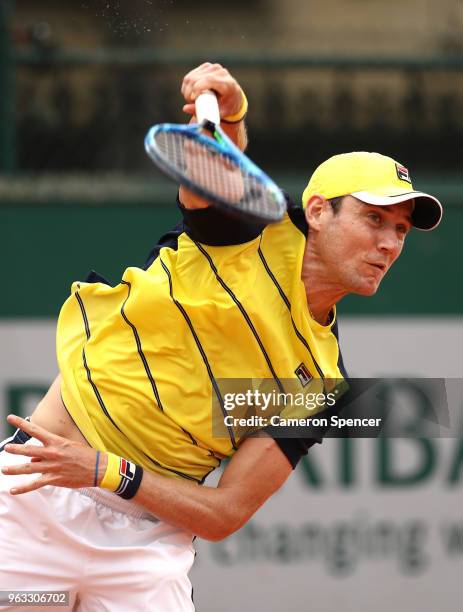 Matthew Ebden of Australia serves during the mens singles first round match against Thomas Fabbiano of Italy during day two of the 2018 French Open...