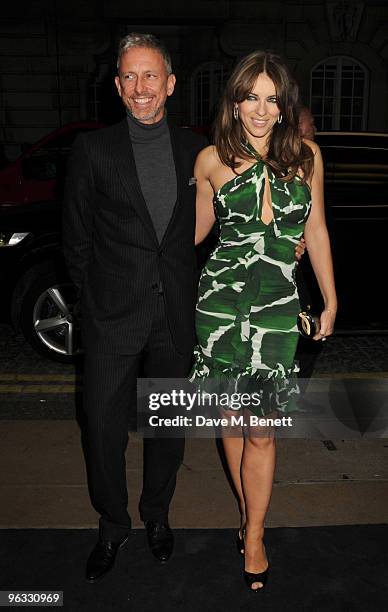 Patrick Cox and Elizabeth Hurley arrive at the UK film premiere of 'A Single Man', at the Curzon Cinema Mayfair on February 1, 2010 in London,...