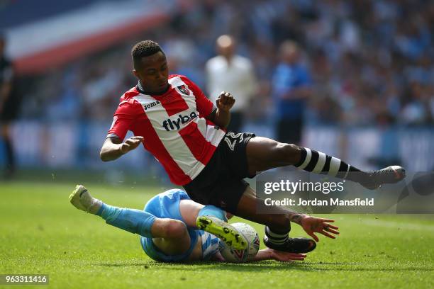 Kyle Edwards of Exeter City and Jack Grimmer of Coventry City in action during the Sky Bet League Two Play Off Final between Coventry City and Exeter...