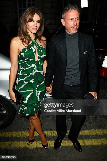 Elizabeth Hurley and Patrick Cox attend UK Film Premiere of 'A Single Man' at The Curzon Mayfair on February 1, 2010 in London, England.