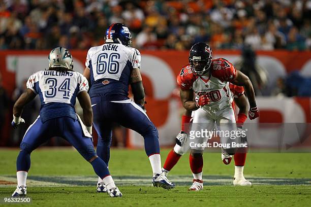 Mario Williams of the Houston Texans in action against David Diehl of the New York Giants plays during the 2010 AFC-NFC Pro Bowl at Sun Life Stadium...