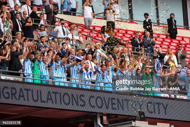 Michael Doyle of Coventry City lifts the EFL Sky Bet League Two play off final trophy with his team mates during the Sky Bet League Two Play Off...