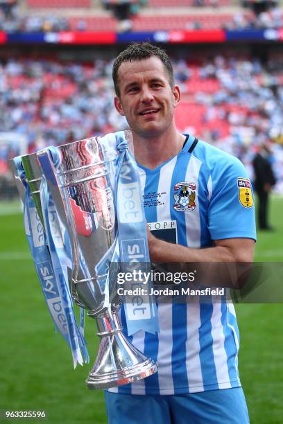 Michael Doyle of Coventry City celebrate victory with the trophy after the Sky Bet League Two Play Off Final between Coventry City and Exeter City at...